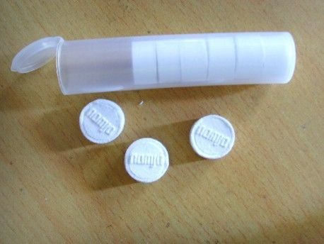 Toalhas de cara mágicas molhadas do tecido mágico branco descartável da moeda do hotel